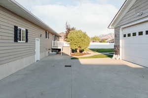 View of patio / terrace featuring a deck with mountain view