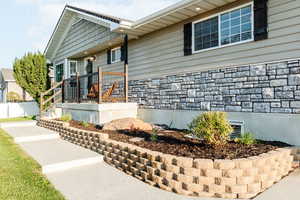 View of front of property featuring stone siding