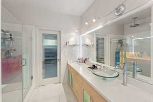 Primary bathroom with soaker tub, heated floors, Bamboo cabinets and Quartz counters, and a large rain shower!