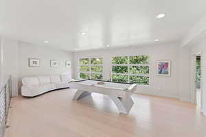 Rec room with pool table and plenty of room to become game area and much more.