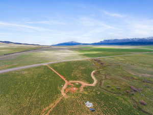 Aerial view of sparsely populated area with mountains