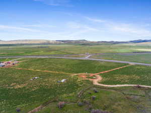 View of property location with rural landscape and mountains