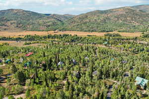 Aerial overview of property's location featuring mountains