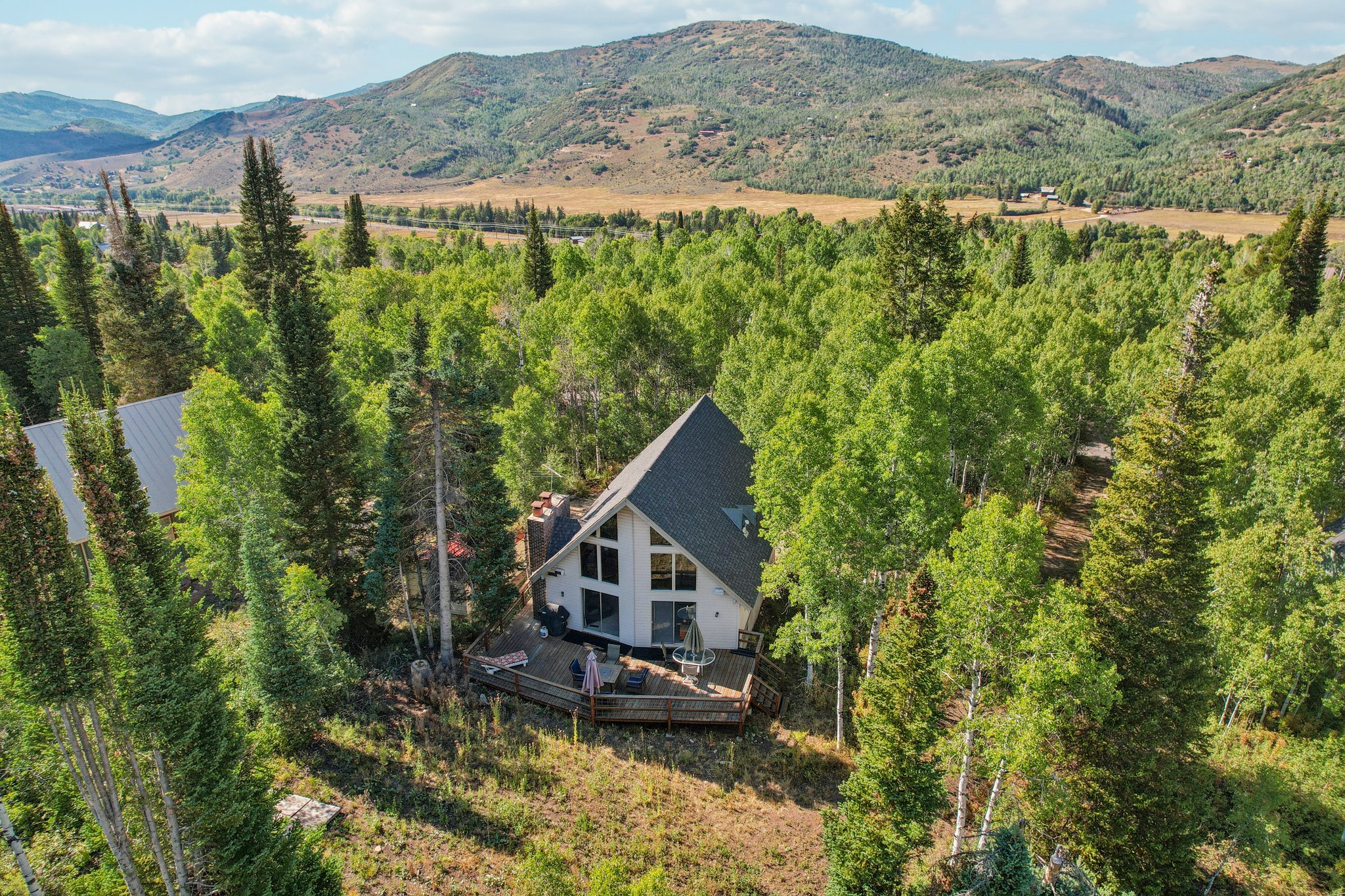 View from above of property with a mountainous background