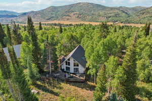 View from above of property with a mountainous background