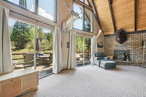 Sunroom featuring a wood stove