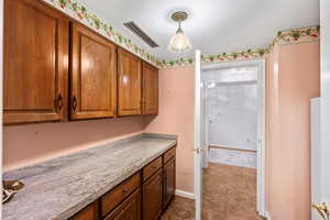 Washroom featuring baseboards