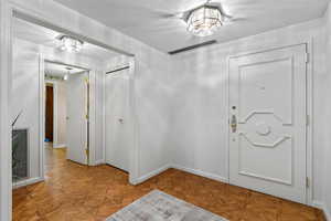 Entryway featuring baseboards