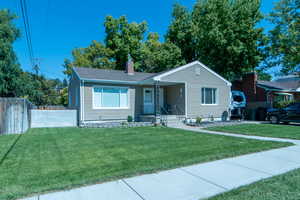 View of front of house featuring a shingled roof