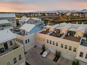 Aerial view at dusk of a residential view and a water view