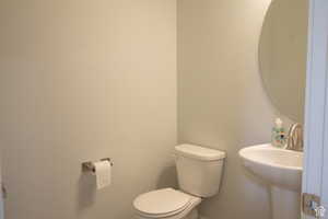 Bathroom featuring toilet and a sink