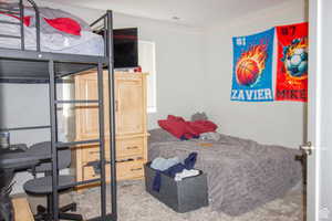 Bedroom featuring carpet flooring