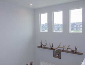 Laundry room featuring recessed lighting