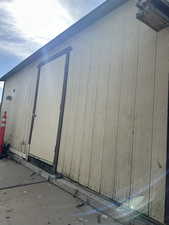 Beautifully maintained home and yard with offstreet parking, carport, outdoor retreat and two large sheds/workshops.