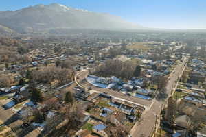 View of property location with nearby suburban area and mountains