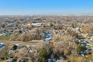 Aerial overview of property's location featuring nearby suburban area