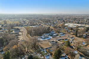 Aerial overview of property's location with nearby suburban area