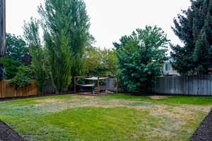 View of fenced backyard