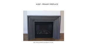 Detailed view of wood finished floors and a fireplace