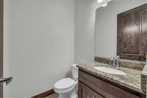 Bathroom with vanity and toilet