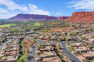 Aerial view of residential area with a mountain backdrop