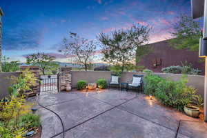 View of patio / terrace featuring a gate
