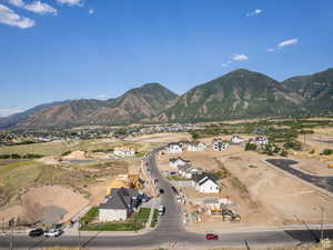 View of mountain background featuring nearby suburban area