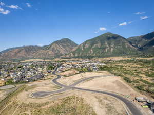 View of mountain background featuring nearby suburban area