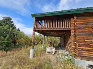 View of yard with a deck