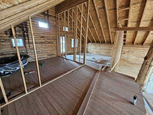 Attic featuring an upstairs landing