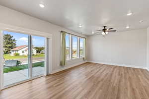Spare room with light wood-type flooring, recessed lighting, and ceiling fan