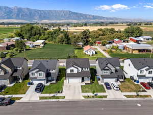 Aerial view of residential area featuring mountains