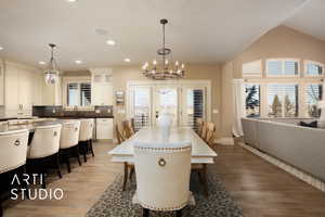 Dining room with a chandelier, recessed lighting, and light wood finished floors