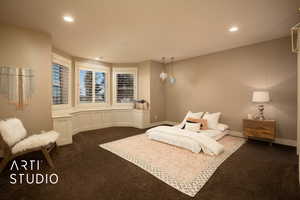 Bedroom with dark colored carpet and recessed lighting