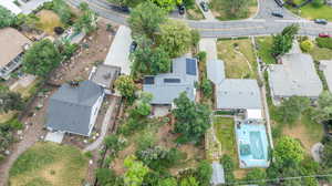 View of property location with nearby suburban area