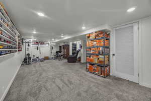 Exercise room featuring carpet and recessed lighting