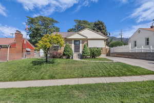 View of front of home featuring brick siding