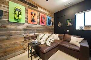 Living area with wood walls