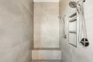 Bathroom featuring tiled shower
