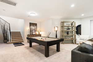 Game room with light colored carpet, recessed lighting, and billiards