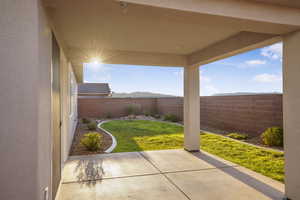 Fenced backyard featuring a patio area