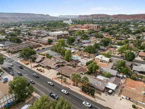 Aerial view of residential area featuring a mountain backdrop