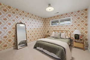 Bedroom featuring carpet flooring