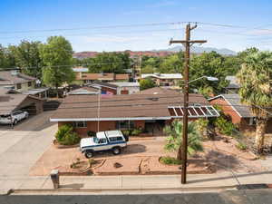 Aerial view of residential area featuring mountains
