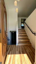 Staircase with wood finished floors