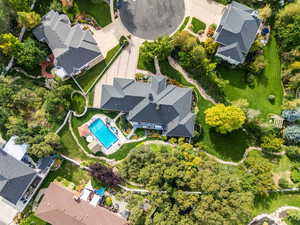 Aerial view of property's location featuring a pool