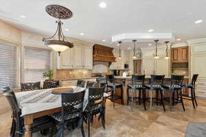 Dining space with recessed lighting
