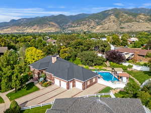 Bird's eye view of a mountainous background and a pool