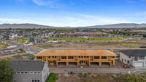 Aerial view of residential area with a mountainous background