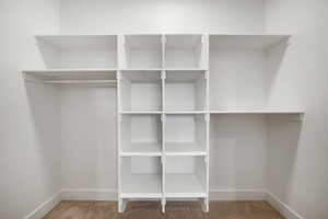 View of primary bedroom closet